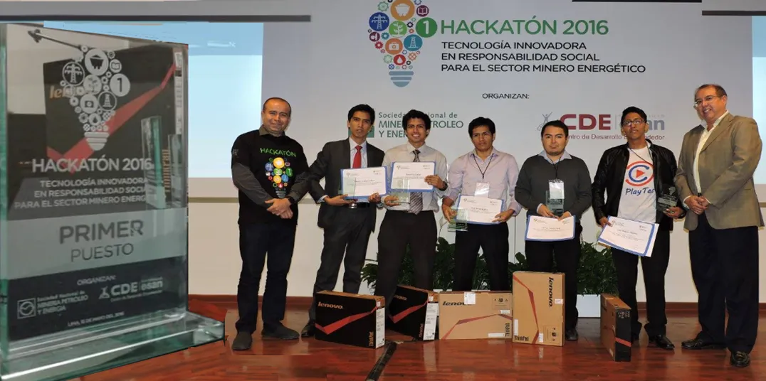 Kenji and teammates receiving first place at the Mining and Energy Hackathon